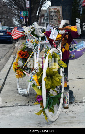 A ghost bike memorial marks the spot in Chicago where 23-year-old Anastasia Kondrasheva was struck and killed by a construction truck Sept. 26, 2016. Stock Photo