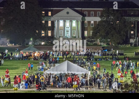 Crowd walks around on lawn in front McKeldin Library at University of the Maryland College Park for homecoming event, Maryland. Stock Photo