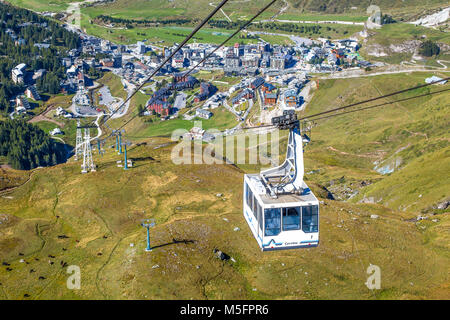 BREUIL-CERVINIA, ITALY SEPTEMBER 5, 2017 - The Cableway connects Breuil-Cervinia to Plan Maison reaching the 2550 metres. Bruil-Cervinia on the backgr Stock Photo