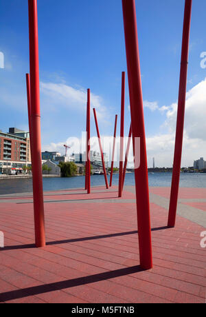 Pole scupture on the Grand Canal Basin, part of the Dublin Docklands area redevelopment project of many high-tech multinationals, aka 'Silicon Docks'. Stock Photo