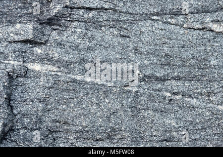 Quartz vein on granite-gneiss rock, nature texture of granite-gneiss rock a gneiss metamorphic rock that transformation from granite igneous rock and  Stock Photo