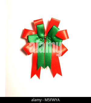 fabric bow isolated on white background, red and green color fabric bow for decorate in christmas or new year time, gift box decoration, wrapping acce Stock Photo