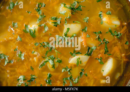 hot cabbage soup in clay bowl Stock Photo