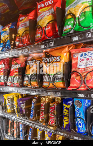 Vending machine in a Premier Inn hotel, selling crisps and chocolate bars Stock Photo