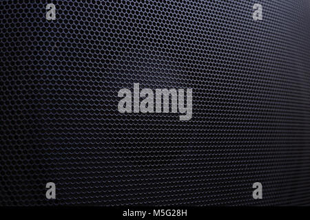 Speaker honeycomb grille background Stock Photo