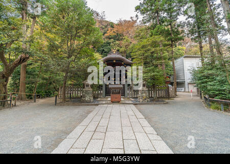 Shirahata Jinja (White Flag shrine). Black painted shinto sub shrine of the Hachiman-gu Shrine in Kamakura. dedicated to Minamoto Yoritomo and Minamot Stock Photo