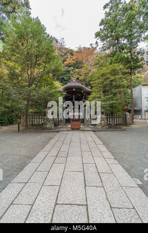 Shirahata Jinja (White Flag shrine). Black painted shinto sub shrine of the Hachiman-gu Shrine in Kamakura. dedicated to Minamoto Yoritomo and Minamot Stock Photo