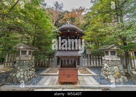 Shirahata Jinja (White Flag shrine). Black painted shinto sub shrine of the Hachiman-gu Shrine in Kamakura. dedicated to Minamoto Yoritomo and Minamot Stock Photo