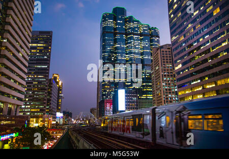 BANGKOK, THAILAND - FEBRUARY 09, 2017 - Cityscape of Bangkok with Chong Nonsi skywalk bridge and BTS skytrain at Chong Nonsi station Stock Photo