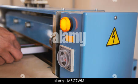 Polygraphic process in a modern printing house - work of press Stock Photo