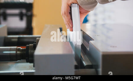 Polygraphic process in a modern printing house - work of press Stock Photo