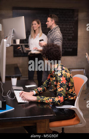 Business colleagues working on computer Stock Photo