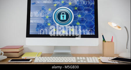 Composite image of desktop pc and various office accessories on table Stock Photo