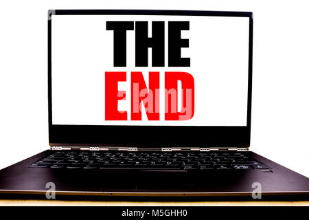 Handwritten text showing The End. Business concept writing for End Finish Close Written on monitor front screen, white background with space view. Stock Photo