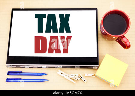 Hand writing text caption inspiration showing Tax Day. Business concept for Income taxation Refund Stock Photo