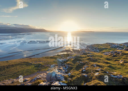 Setting sun over Irish Sea seing from the top of  Great Orme hill in Llandudno, North Wales, UK Stock Photo