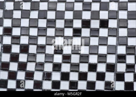 Black and white glass tile checkerboard closeup texture Stock Photo