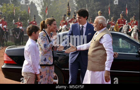 New Delhi, India. 23rd Feb, 2018. Indian Prime Minister Narendra Modi (R) welcomes his Canadian counterpart Justin Trudeau (2nd, R) and his wife Sophie Gregoire Trudeau (2nd, L) as his elder son Xavier looks on upon their arrival at the Indian Presidential Palace in New Delhi, India, on Feb. 23, 2018. Credit: Partha Sarkar/Xinhua/Alamy Live News