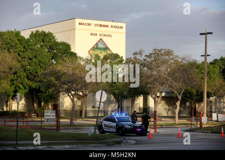 Coral Springs, FL, USA. 23rd Feb, 2018. Teachers and school administrators returned to Marjory Stoneman Douglas High School for the first time after 17 victims were killed in a mass shooting at the school. Mike Stocker, South Florida Sun-Sentinel Credit: Sun-Sentinel/ZUMA Wire/Alamy Live News Stock Photo