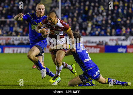 Friday 23rd February 2018, Halliwell Jones Stadium, Warrington, England; Betfred Super League rugby, Warrington Wolves versus Wigan Warriors;   Wigan Warriors Thomas Leulai is tackled by Warrington Wolves Stefan Ratchford during the Betfred Super League game between Warrington Wolves and Wigan Warriors on Friday 23rd Feb 2018 at the Halliwell Jones Stadium Stock Photo