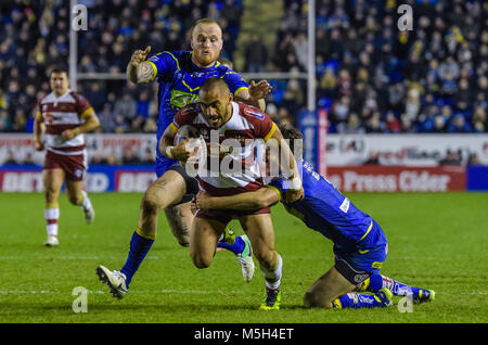 Friday 23rd February 2018, Halliwell Jones Stadium, Warrington, England; Betfred Super League rugby, Warrington Wolves versus Wigan Warriors;   Wigan Warriors Thomas Leulai is tackled by Warrington Wolves Stefan Ratchford during the Betfred Super League game between Warrington Wolves and Wigan Warriors on Friday 23rd Feb 2018 at the Halliwell Jones Stadium Stock Photo