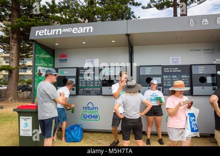 The NSW Government continues to roll out its container deposit scheme known as Return and Earn, where 10c can be earned or donated to charity for each elligible plastic or cardboard carton that is recycled at the 400 return and earn depots across the State, Saturday 24th February 2018. Stock Photo