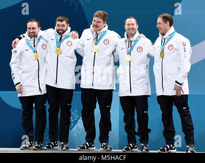 Pyeongchang, South Korea. 24th Feb, 2018. Champion team of the United States pose for photos during medal ceremony of men's curling at the 2018 PyeongChang Winter Olympic Games at Gangneung Curling Centre, Gangnueng, South Korea, Feb. 24, 2018. Credit: Ma Ping/Xinhua/Alamy Live News Stock Photo