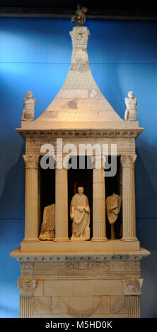 Mausoleum of Lucius Poblicius. 40 AD. Veteran of the 5th Legion. In the central part of the portico with columns is the figure of the deceased as a citizen, wearing a toga and surrounded by his family. Found in Cologne, Germany. Roman-Germanic Museum. Cologne. Germany. Stock Photo