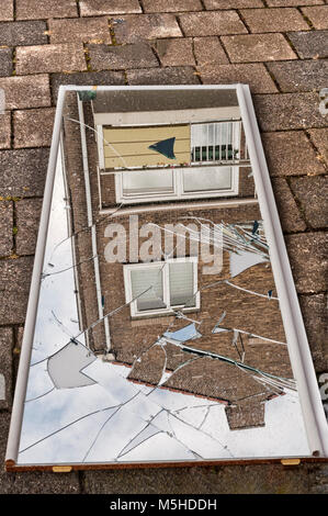 broken mirror on the ground Stock Photo