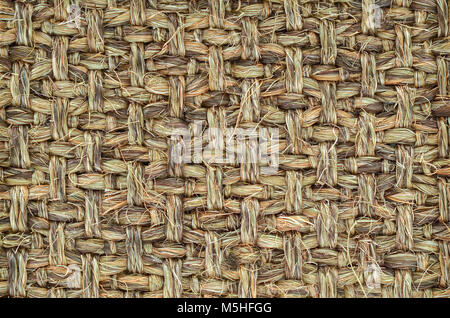 Close up of Hand Woven / Tied Rug Detail, Patterned Sisal, Hemp Background Texture. Stock Photo