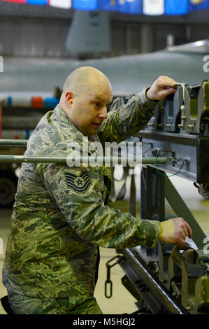 U.S. Air Force Tech. Sgt. Jacob Oliver, 52nd Aircraft Maintenance Squadron weapons team chief, prepares a dummy missile before transport onto an F-16 Fighting Falcon in Hangar 1 at Spangdahlem Air Base, Germany, Feb. 9, 2018. Oliver led a three man team during the competition. (U.S. Air Force Stock Photo