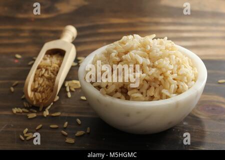 Cooked Whole grain brown rice served in a bowl, selective focus Stock Photo