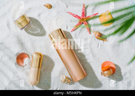 Summer beach vacation and accessories on sand background. Stock Photo