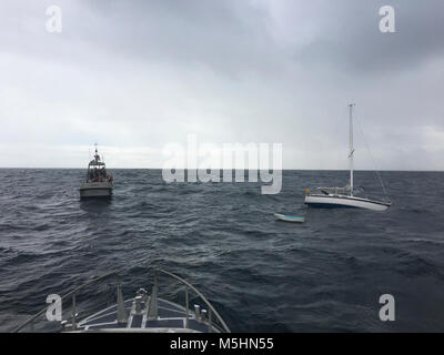 Coast Guard Station Morro Bay Motor Lifeboat crews arrive on scene to assist a sailing vessel taking on water in the vicinity of Point Piedras Blancas, California, Feb. 12, 2018. Due to inclement weather, three people and their cat were hoisted into a Coast Guard Air Station San Francisco Forward Operating Base Point Mugu MH-65 Dolphin helicopter from the sailing vessel and transported to Paso Robles Airport. (U.S. Coast Guard Stock Photo