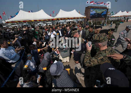 U.S. Ambassador to Thailand Glyn Davies, Gen. Thanchaiyan Srisuwan, Chief of Defense Forces in Thailand, and U.S. Marine Corps. Lt. Gen. Lawrence Nicholson, III Marine Expeditionary Force commanding general, answer questions from the media Feb. 13, 2018, after the opening ceremony of Exercise Cobra Gold 2018 at U-Tapao International Airport, Ban Chang district, Rayong province, Thailand. Cobra Gold 18 provides a venue for both United States and partner nations to advance interoperability and increase partner capacity in planning and executing complex and realistic multinational force and combi Stock Photo