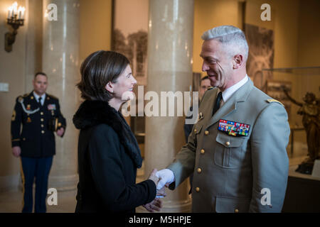 Gen. François Lecointre (right), chief of the defence staff, French Armed Forces; is greeted by Katharine Kelley (left), superintendent, Arlington National Cemetery, in the Memorial Amphitheater Display Room at Arlington National Cemetery, Arlington, Virginia, Feb. 12, 2018. Lecointre visited ANC as part of his first official visit, touring the Memorial Amphitheater Display Room and participating in an Armed Forces Full Honors Wreath-Laying Ceremony at the Tomb of the Unknown Soldier. (U.S. Army Stock Photo