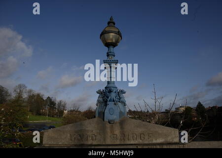 Lisburn, Northern Ireland. Lisburn (/'l?z.b?rn/ or /'l?s.b?rn/; meaning 'fort of the stream', probably from Irish lios, meaning 'fort', and Scots burn, meaning 'stream') is a city in Northern Ireland. It is 8 mi (13 km) southwest of Belfast city centre, on the River Lagan, which forms the boundary between County Antrim and County Down. Lisburn is part of the Belfast Metropolitan Area. It had a population of over 71,469 people in the 2011 Census. Formerly a borough, Lisburn was granted city status in 2002 as part of Queen Elizabeth II's Golden jubilee celebrations. It is the third-largest city  Stock Photo