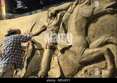 Artist working on a Sand Sculpture, Calgary, Stampede, Calgary, Alberta, July 11, 2011 Stock Photo