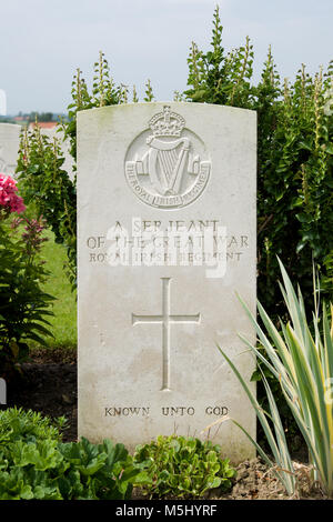 The grave of an unknown soldier from the Royal Irish Regiment buried in Tyne Cot Military Cemetery, Leper, Belgium Stock Photo
