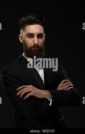 Portrait of a young man, looking self-assured Stock Photo