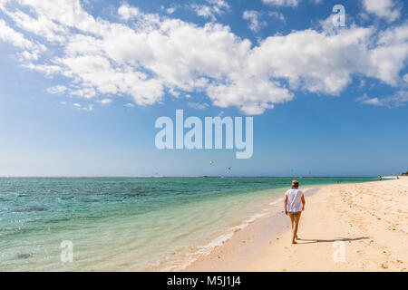 Mauritius, Southwest Coast, Indian Ocean, beach of Le Morne, female tourist at beach Stock Photo