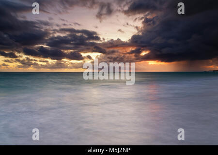 Carribean, Dominican Republic, Punta Cana, Playa Bavaro, view to the sea at sunrise Stock Photo