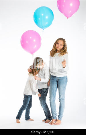 Children playing with balloons Stock Photo