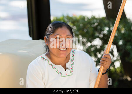 Smiling, Beautiful, Mexican Woman Housekeeper at a Resort in Mexico Stock Photo