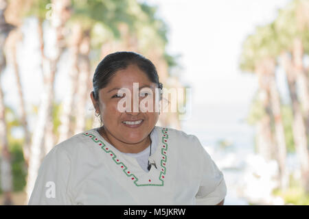 Smiling, Beautiful, Mexican Woman Housekeeper at a Resort in Mexico Stock Photo