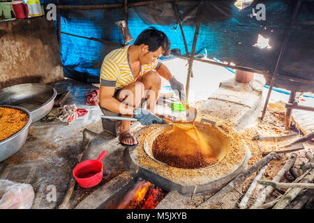 Processing Tây Ninh shrimp salt (muoi tom) of Vietnamese cuisine. Tay Ninh is famous for wholesale shrimp salt in Vietnam Stock Photo