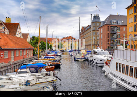 Copenhagen, Zealand region / Denmark - 2017/07/26: panoramic view of the contemporary architecture and water canals of the Christianshavn district Stock Photo