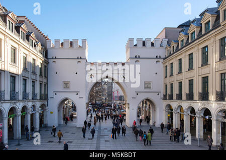 Street scene in old town city centre at 18th century Karlstor gate (1701) on Neuhauser Strasse, Karlsplatz, Munich, Bavaria, Germany, Europe Stock Photo