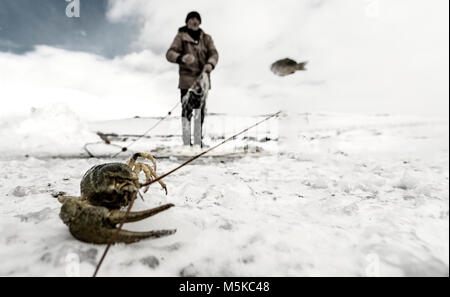 The biggest freshwater lake, Çıldır Lake, enjoys fishing, both for fishermen and for visitors. Starting from November, the ice layer on the Çıldır Lak Stock Photo