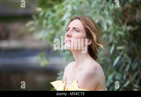 Russia, Moscow, Izmaylovsky Park, August 27, 2017. International Photo Festival.A suffering young woman. Suffering on the face. Stock Photo